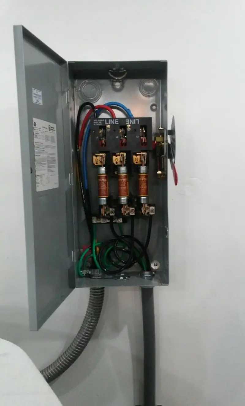 Three-phase disconnect switch installed for Smoke Detector Installation in Crittenden